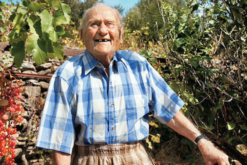 Photograph of Stamatis Moraitis on his home island of Ikaria. Photo via BBC.