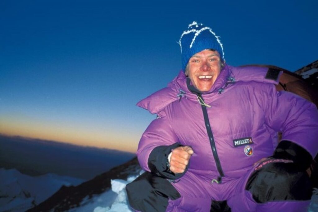 Photograph of Marco Siffredi on top of a mountain.