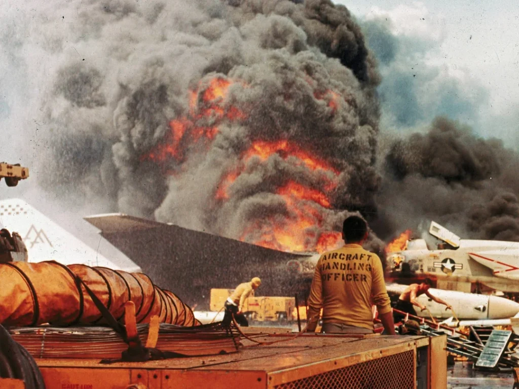 Accidental rocket launch aboard the USS Forrestal hit a fighter on the deck piloted by John McCain. The resulting fire killed 134. McCain narrowly escaped the plane - Vietnam. July 29, 1967.