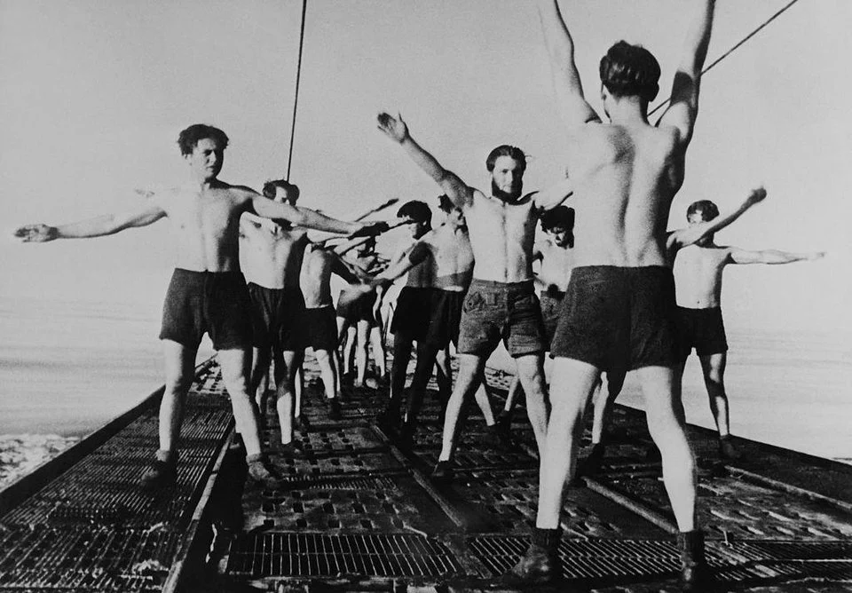 Crew of a German U-boat perform calisthenics on the deck of their submarine, Atlantic Ocean, December 1943