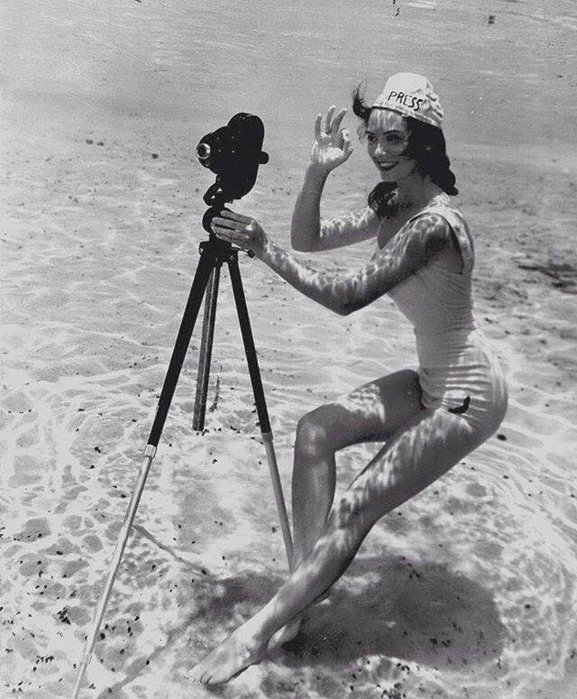Underwater camera operator, 1940's.