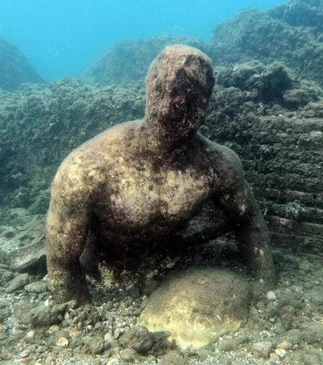 An underwater statue at the sunken Roman city of Baiae. 100 BC to AD 500.