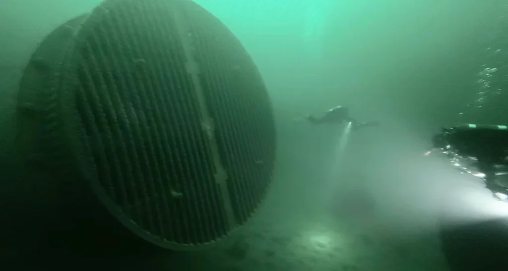 Diving next to water intake pipes