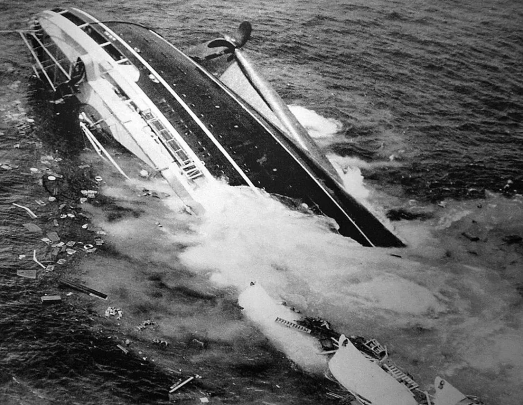 July 26, 1956: Harry Trask's Pulitzer Prize-winning photograph capturing the final moments of the SS Andrea Doria, after her catastrophic collision with the MS Stockholm off Nantucket the previous night.