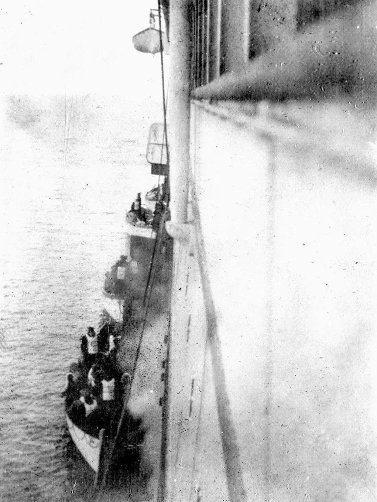 The surviving passengers of the Titanic disembark on board the Carpathia, 1912